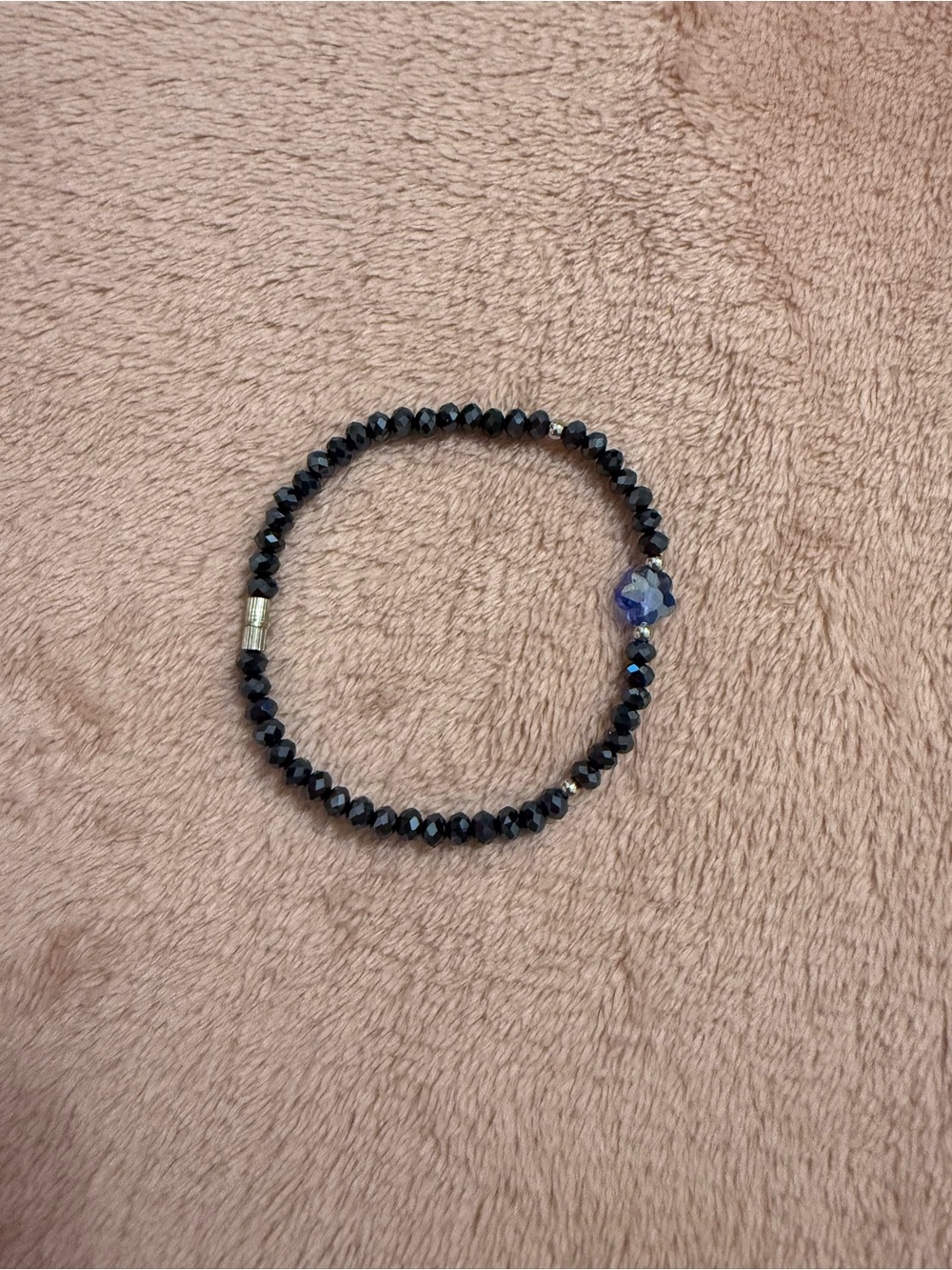 Faceted Black Bead Stretch Bracelet with Purple Accent